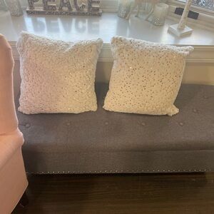 Pier 1 imports gold accented pillows.